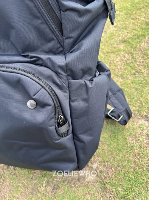 Bottom zipper can be secured under elastic band too. You can put bottles on both sides.